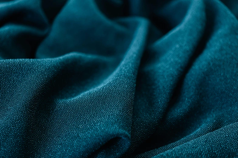 a close up view of an emerald green colored fabric