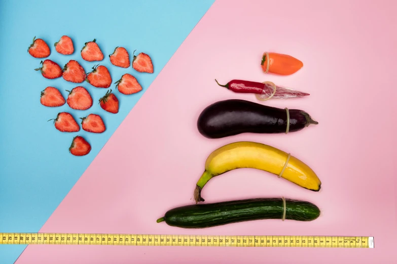 a number of fruits and vegetables on a pink and blue background, scale, bisexual lighting, measurements, uncrop