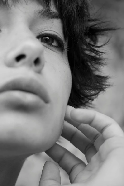 a close up of a person holding a cell phone to their ear, a black and white photo, inspired by irakli nadar, hyperrealism, black-hair pretty face, :: morning, attractive neck, pouty