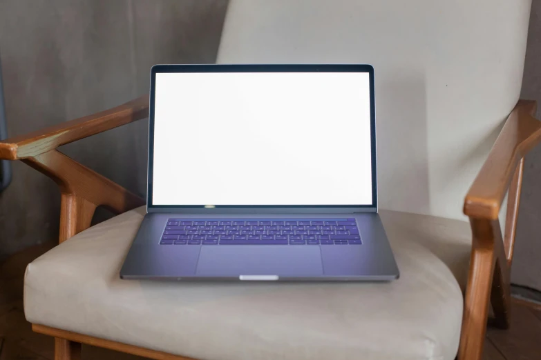a laptop computer sitting on top of a wooden chair, a computer rendering, pexels, looking straight to camera, rectangle, white, glowing screen