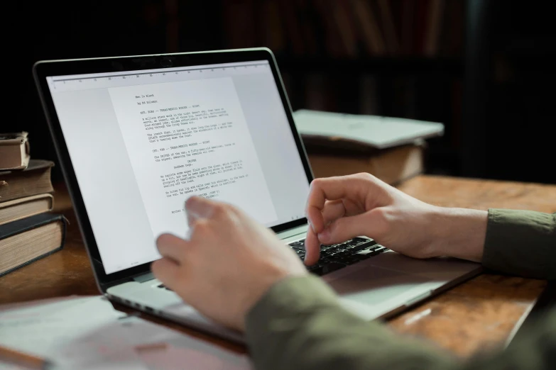 a close up of a person typing on a laptop, a digital rendering, pexels, manuscript, multiple stories, a wide shot, robb cobb