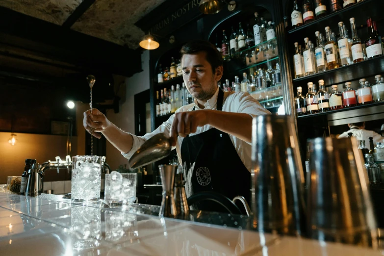 a man that is standing in front of a bar, pouring techniques, jakub gazmercik, profile image, thumbnail