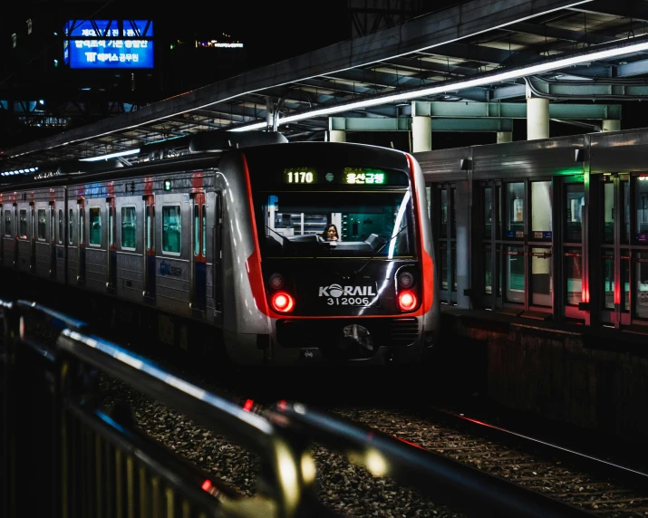 the passenger train is stopped at the train station