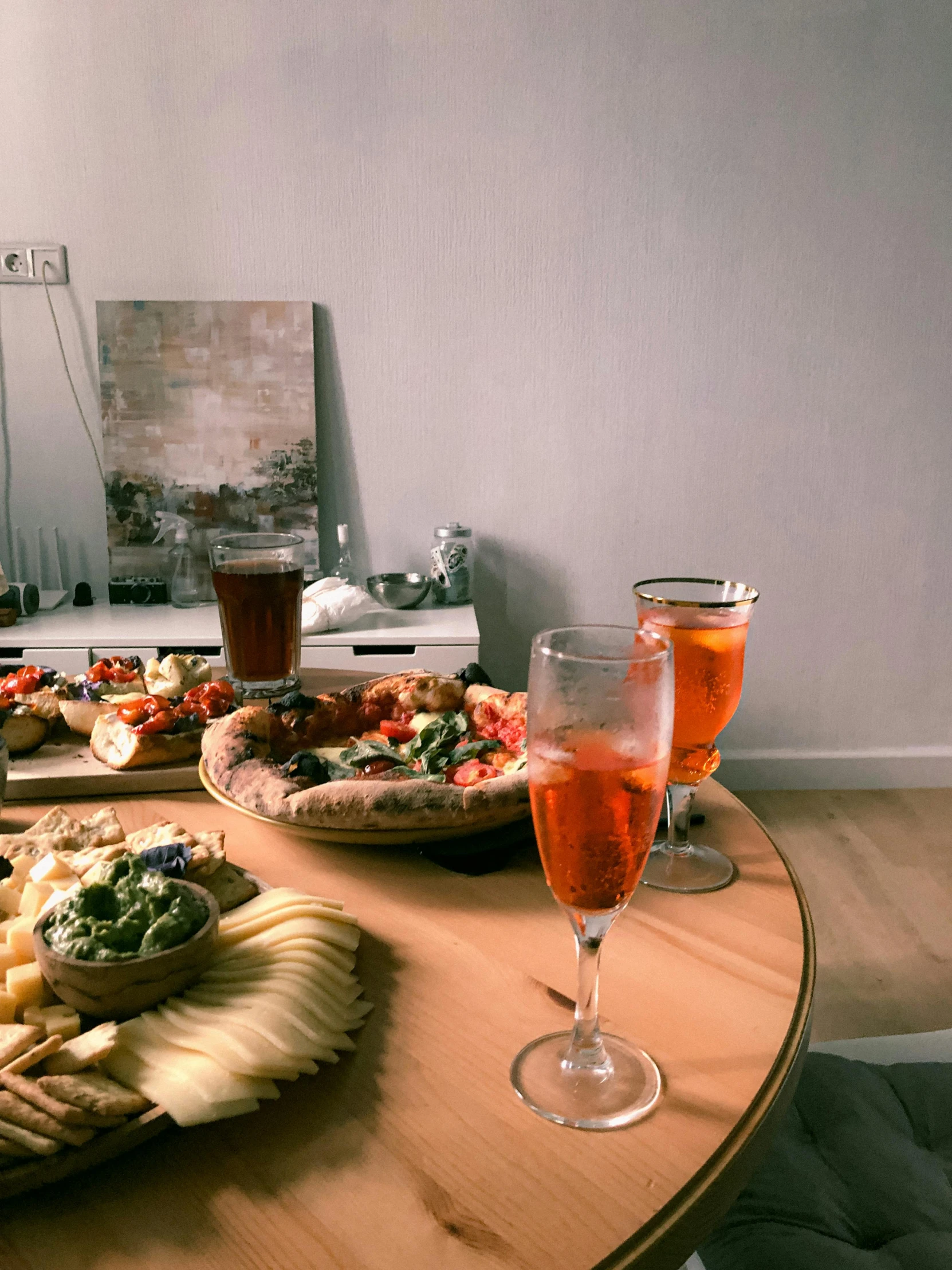 a table topped with food and drinks sitting next to each other