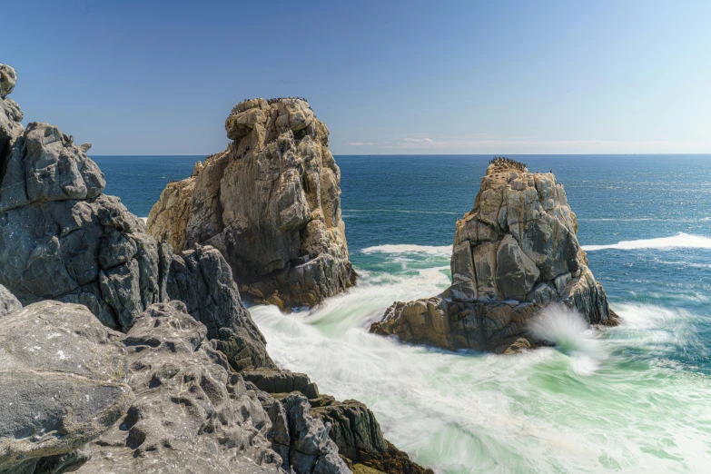 a large body of water near some rocks, pexels contest winner, les nabis, rock arcs, abel tasman, gigapixel photo, chile