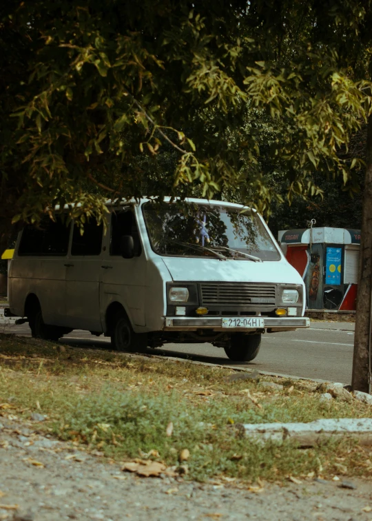 a van is parked on the side of the road, by Attila Meszlenyi, [ cinematic, square, 15081959 21121991 01012000 4k, 1980's