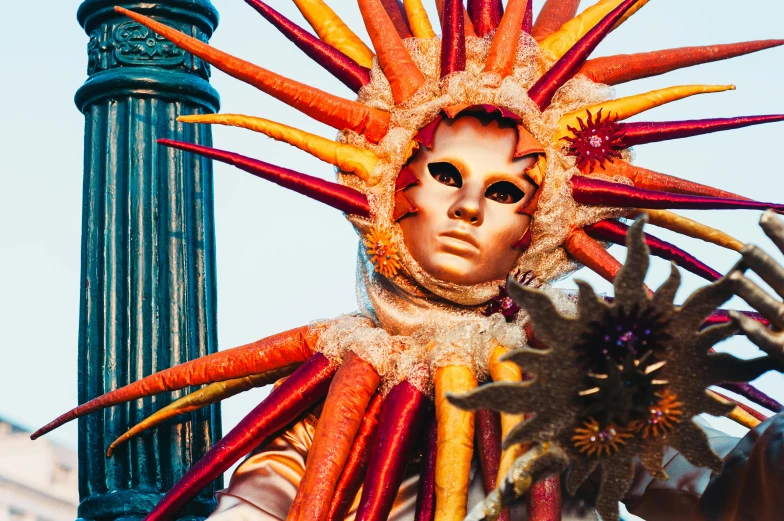 a statue of a woman with carrots on her head, an album cover, inspired by Quirizio di Giovanni da Murano, pexels contest winner, carnival mask, spiky tentacles, venice, colorful ferrofluid armor