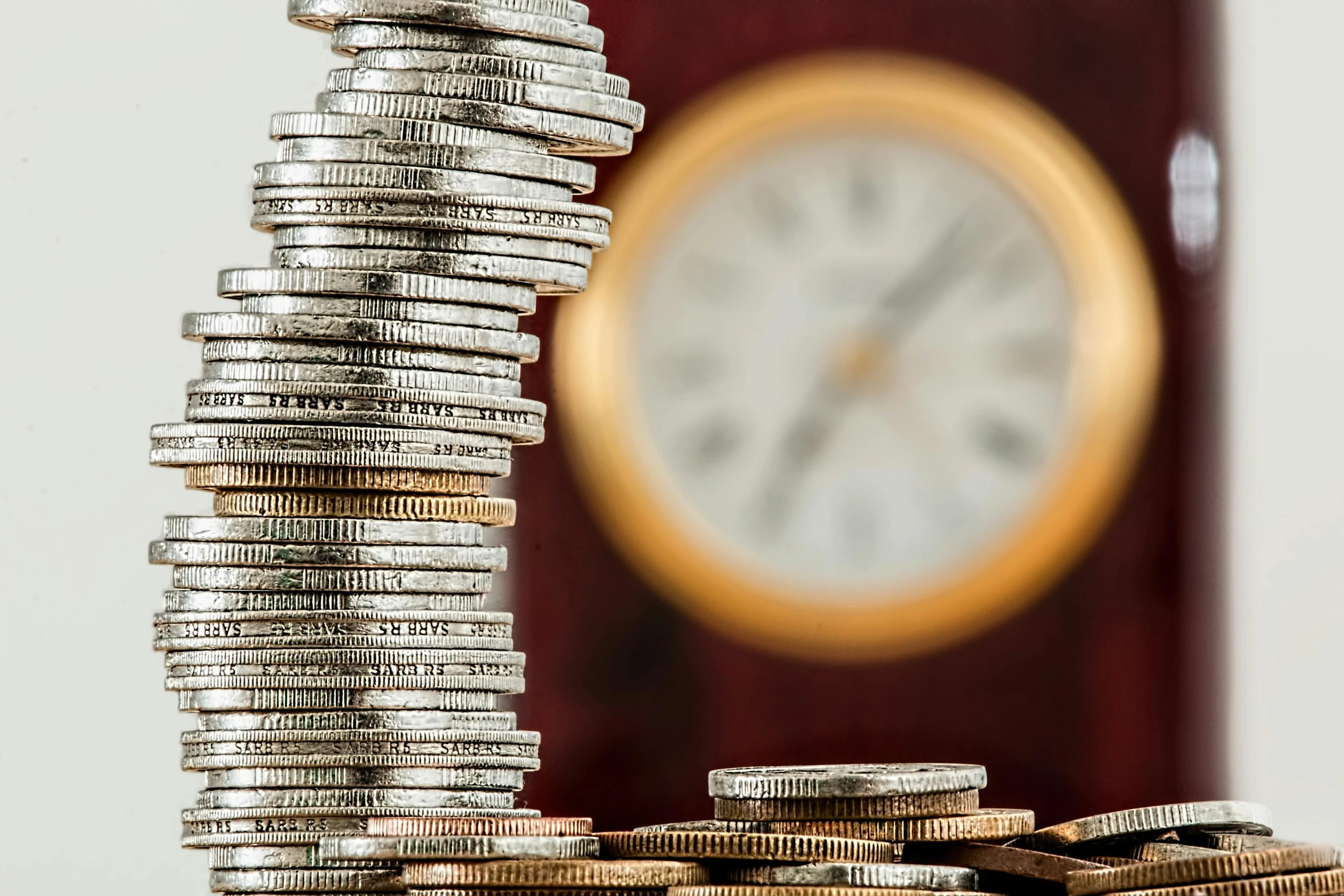 a stack of coins with a clock in the background, a photo, pixabay, background image, cash on a sidetable, group photo, thumbnail