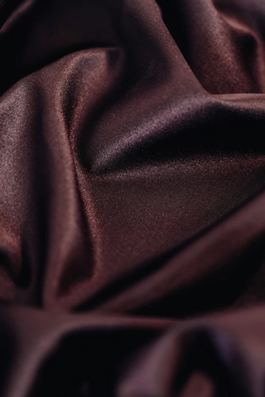 a close up of a dark colored cloth, chocolate, dark purple garments, pearlescent, dark matte