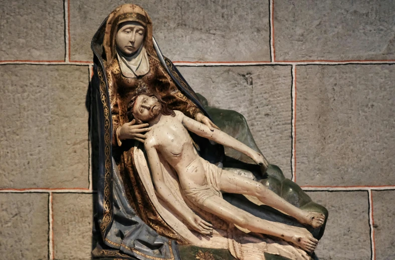 a statue of a woman laying on a man, by Simone Martini, renaissance, [sculpture] and [hyperrealism], virgin mary, gettyimages, multilayer