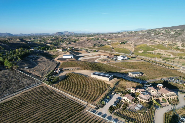 an aerial view of a farm and winery