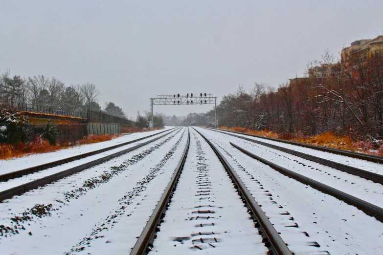 a train track that is covered in snow, by Carey Morris, unsplash, fan favorite, new jersey, rectangle, in 2 0 1 2