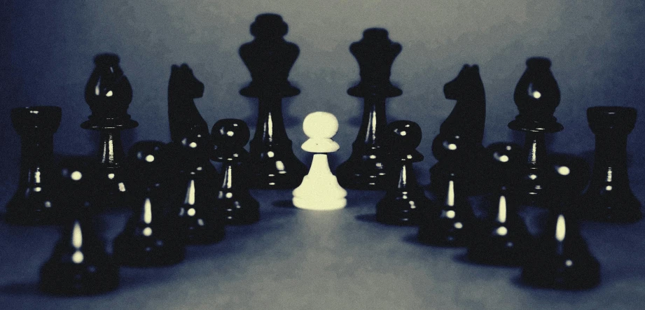 a group of black and white chess pieces, a black and white photo, by Adam Marczyński, unsplash, synthetism, overdetalized, one person only, instagram picture, realista