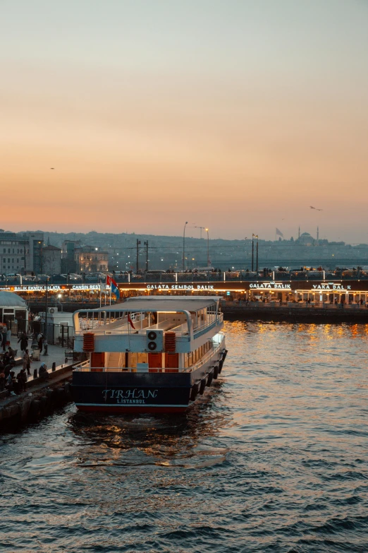 a couple of boats that are in the water, by irakli nadar, happening, istanbul, at twilight, square, low quality photo