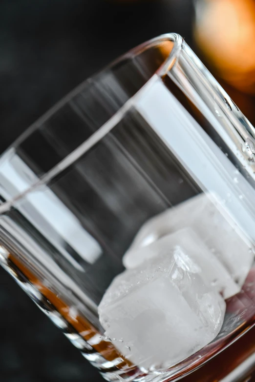 a close up of ice cubes in a glass