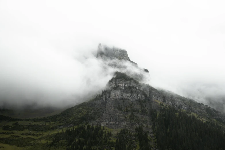 the mountains are covered in cloud and rain