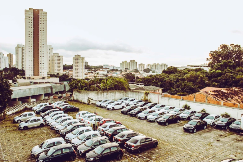 there is an overhead view of a parking lot with many parked cars