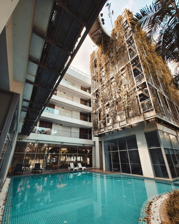 a large swimming pool that has a fire escape