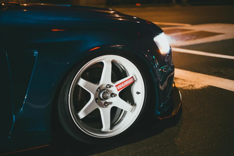 a close up of the rim of a car