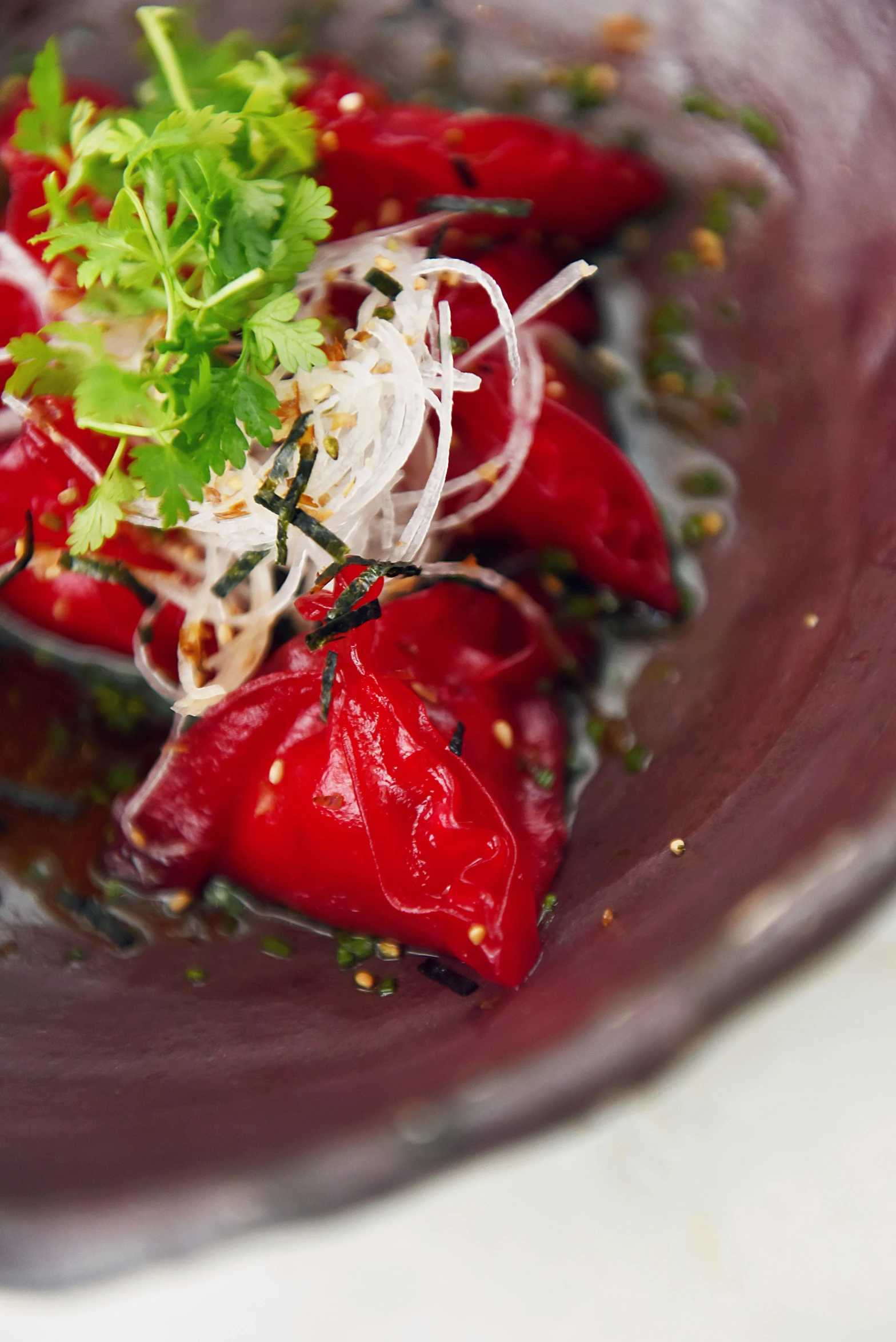 a close up of a bowl of food on a table, mingei, crimson, very intense, harbor, grey