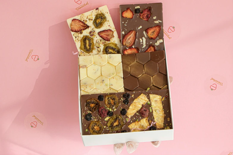 a close up of a box of food on a table, fully chocolate, multi-part, blushing, honeycomb