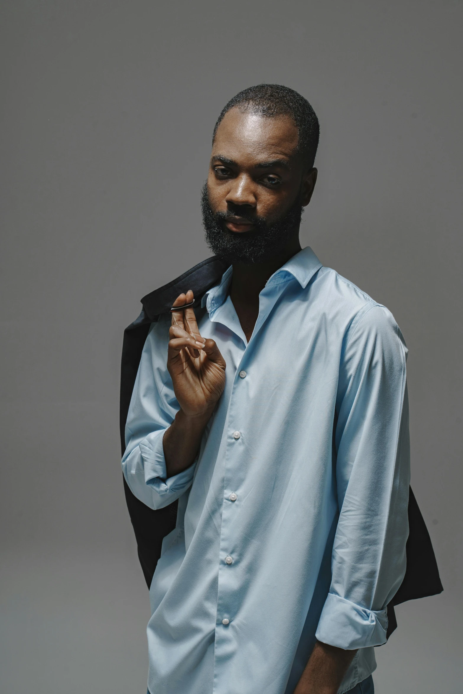 an african american man with a suit and jacket