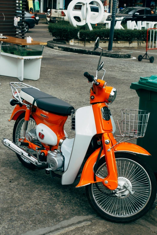 an orange and white motorcycle parked next to a trash can, a colorized photo, unsplash, 🚿🗝📝, custom scooter, avatar image, japanese collection product