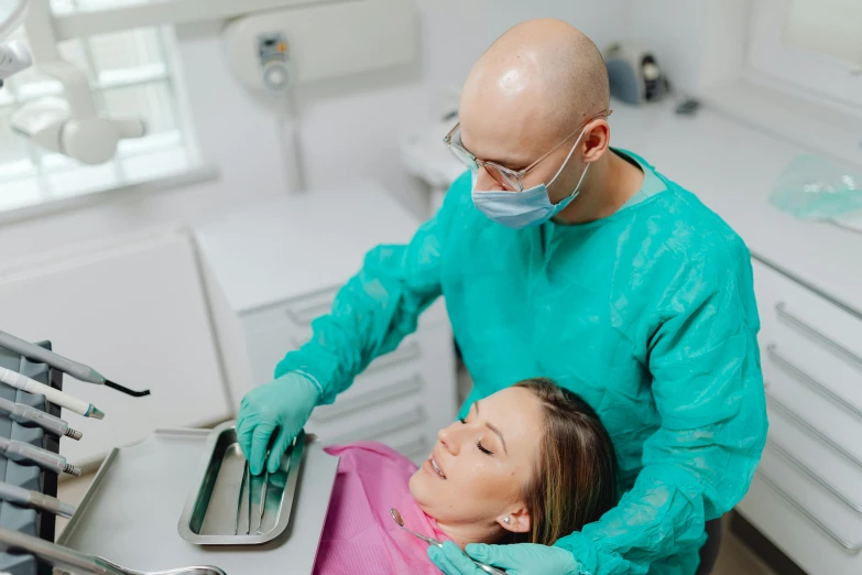 a man and a woman sitting in a dentist's chair, by Adam Marczyński, pexels contest winner, hurufiyya, caring fatherly wide forehead, thumbnail, acid leaking from mouth, profile image