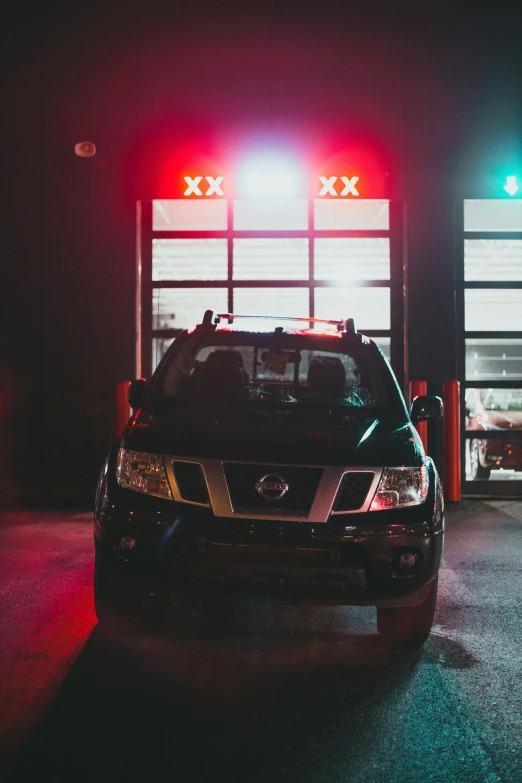 a car parked at the exit with a red light on