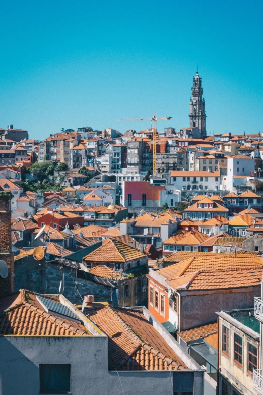 a view of a city from the top of a building, baroque, orange roof, circular towers, medieval coastal village, profile image