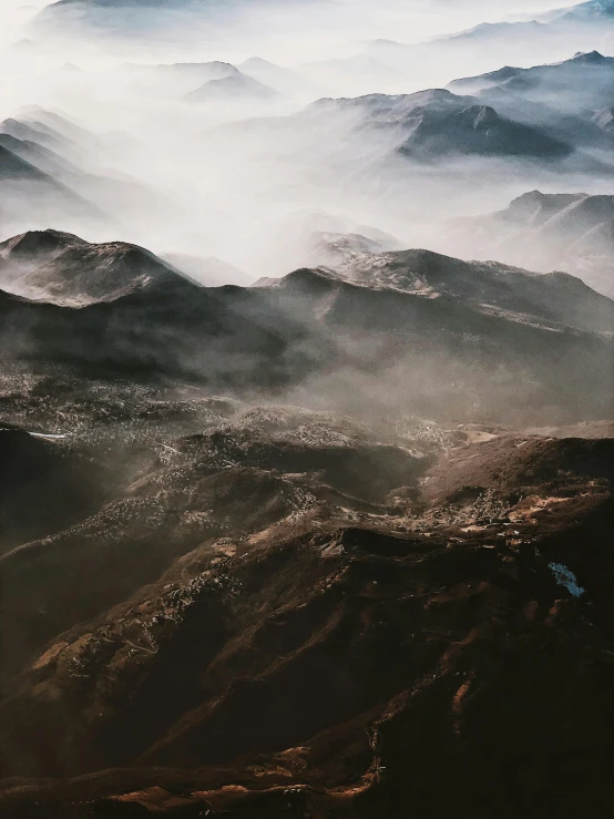 view of mountains and valleys on a hazy day