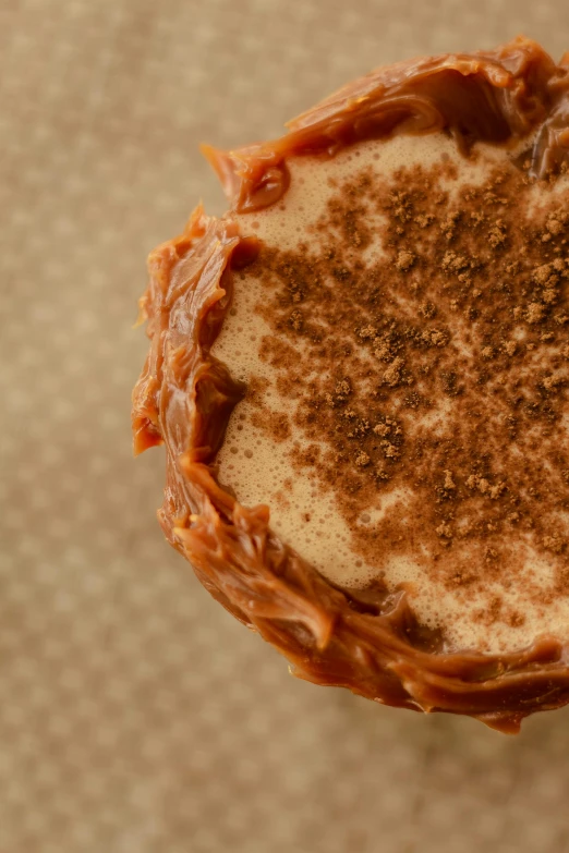 a close up of a pastry on a table, mocha swirl color scheme, top-down shot, caramel. rugged, promo image