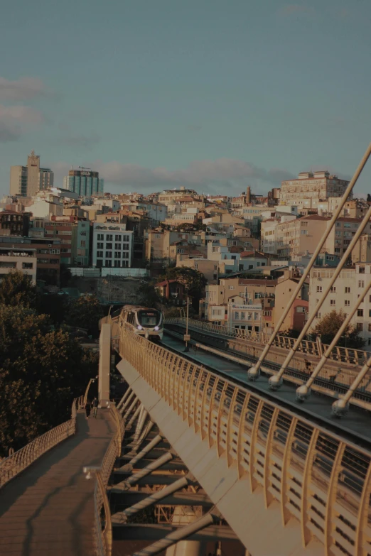 a view of a city from the top of a bridge, icaro carvalho, built on a steep hill, profile image, gigapixel photo