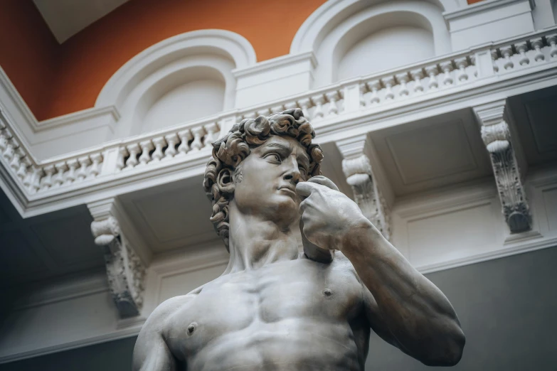 a close up of a statue of a man, a statue, inspired by Michelangelo Buonarotti, pexels contest winner, inside a museum, bronze statue and silver, macho pose, 🦩🪐🐞👩🏻🦳