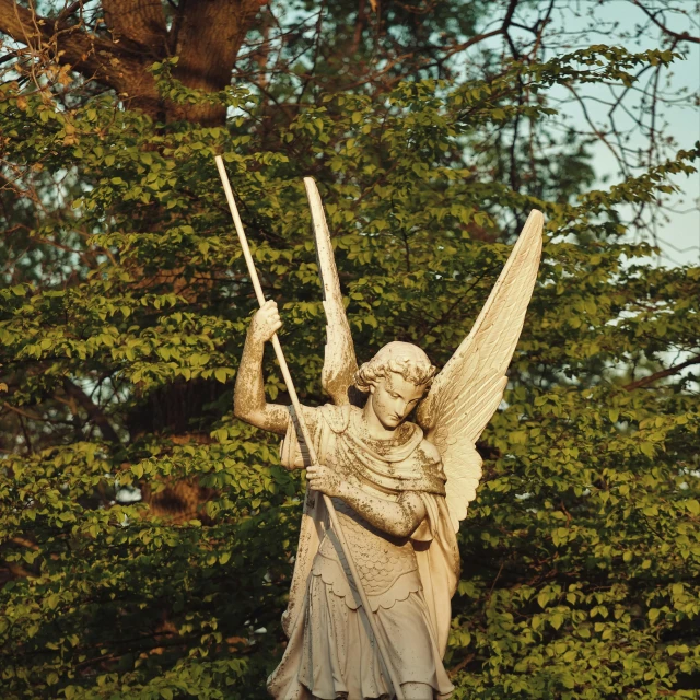 a statue of an angel holding a staff, a statue, pexels contest winner, hold sword in the forest, patron saint of 🛸🌈👩🏾