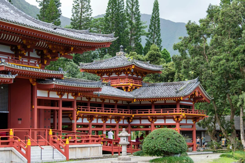 the japanese style building is painted bright red