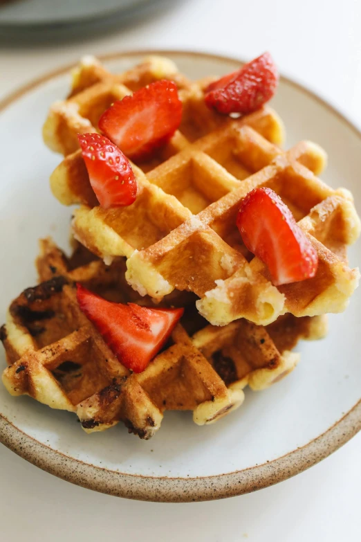 a white plate topped with waffles and strawberries, longque chen, 2. 5 - dimensional, finely textured, kids