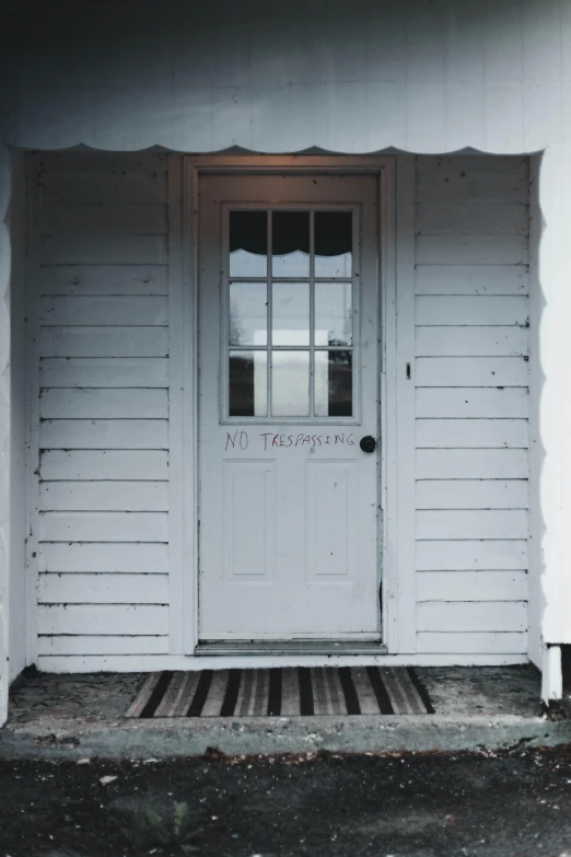 a red fire hydrant sitting in front of a white house, an album cover, by Jan Tengnagel, unsplash, wood door, new hampshire, chalked, teenage no