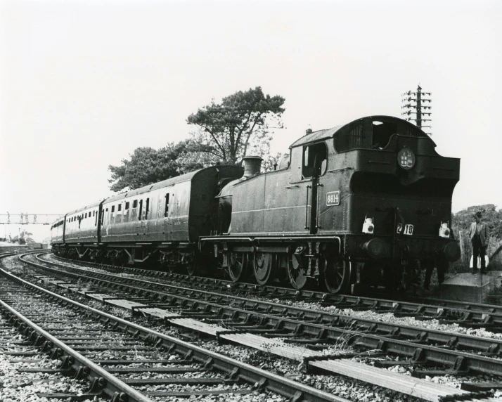 a black and white photo of a train on the tracks, a black and white photo, private press, 1981 photograph, ox, 1 9 6 2, pr shoot