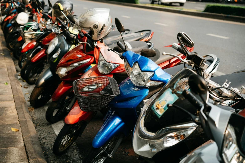a row of motorcycles parked on the side of the road, pexels contest winner, 🦩🪐🐞👩🏻🦳, colourful close up shot, avatar image, moped