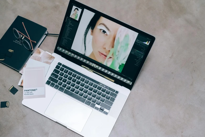 a laptop computer sitting on top of a table, trending on pexels, with professional makeup, avatar image, instagram photo, nanae kawahara