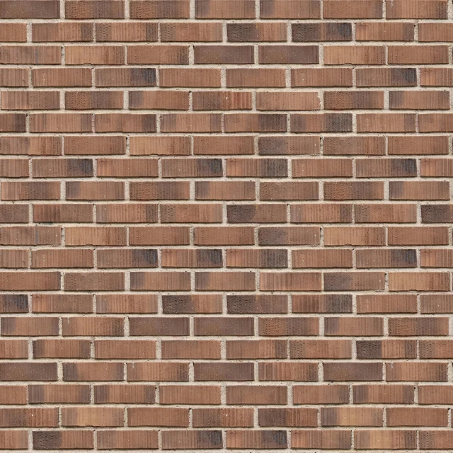 a brick wall with small squares and a line of smaller ones