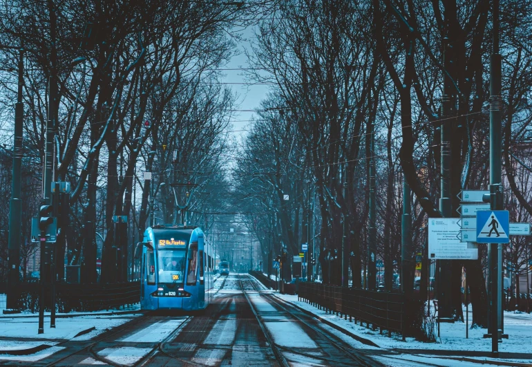 a train on railroad tracks with no cars in the background