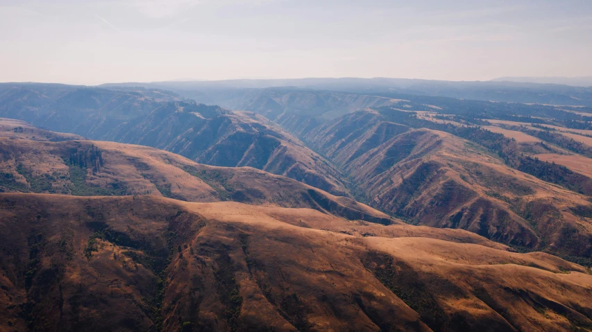 the landscape is very brown and it has no clouds