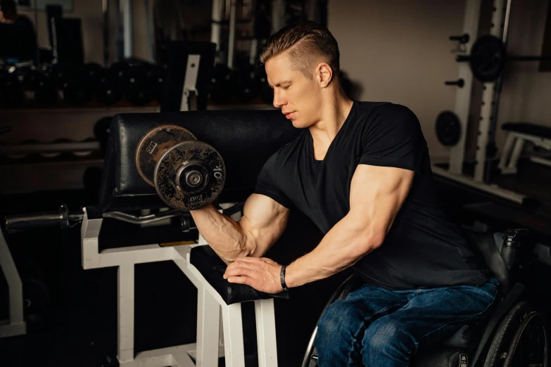 a man with a cast doing a bench press