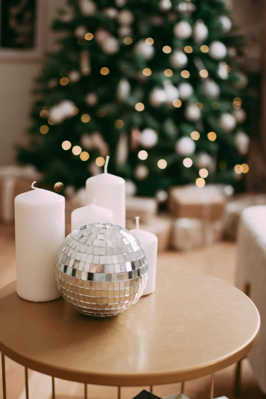 a table with two candles sitting on it