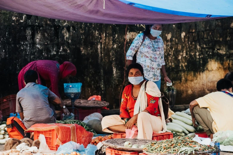 a group of people at an outdoor market, by Meredith Dillman, pexels contest winner, masked person in corner, assamese, thumbnail, square