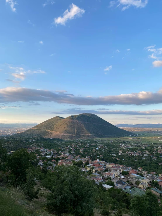 a beautiful landscape of the city and mountains