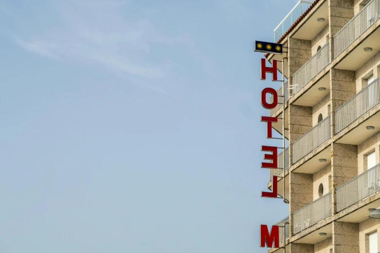 the front of a large el building with balconies