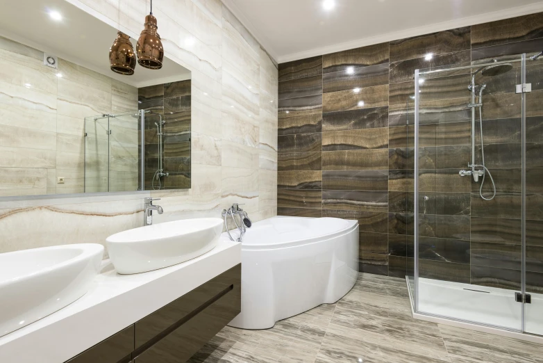 a bathroom has large marble slabs on the wall